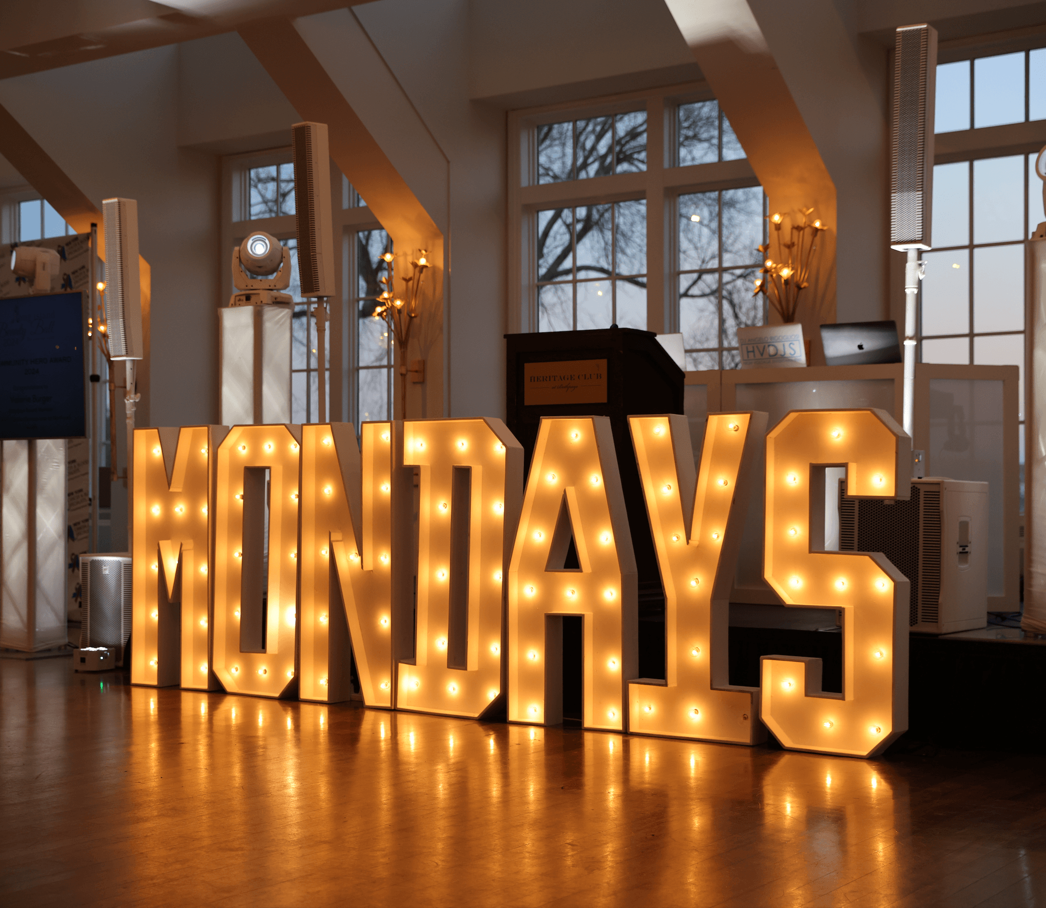 Logo for Mondays at Racine Beauty Ball